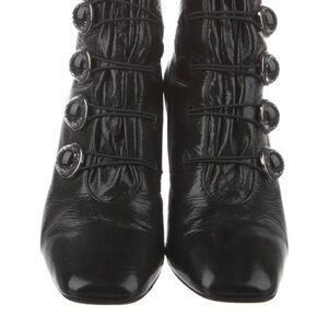 Christian Louboutin black patent leather boots